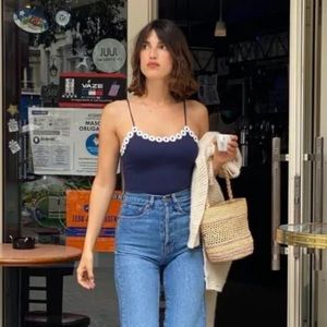 navy blue bodysuit with daisy trim